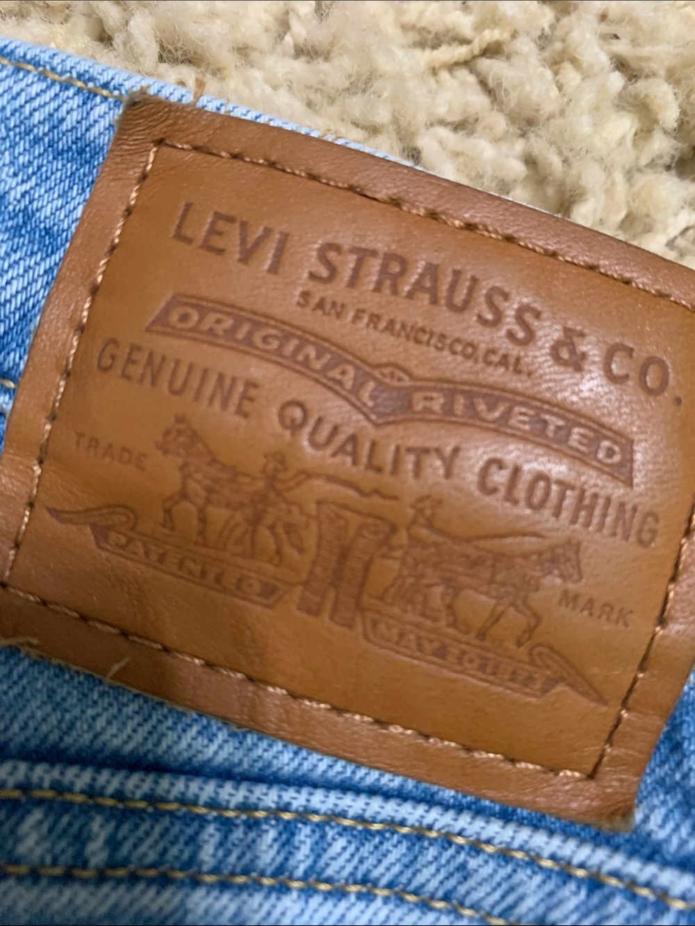 Vintage LEvi’s 501 Light Blue woman’s Jeans with Brown Leather Patch
